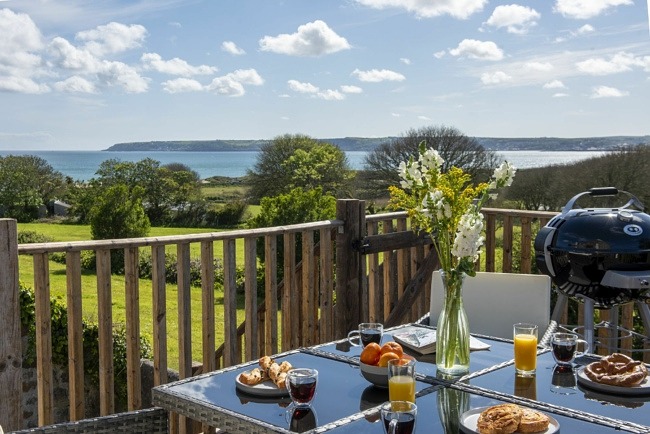 Balcony over looking the garden and sea - Greenfields Coach House