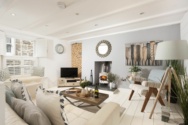 Living room with fireplace, TV and sofa - Gylly Cottage