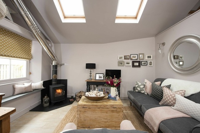 Lounge with wood burner, mirror, lamps, TV and sofas - The store Room 