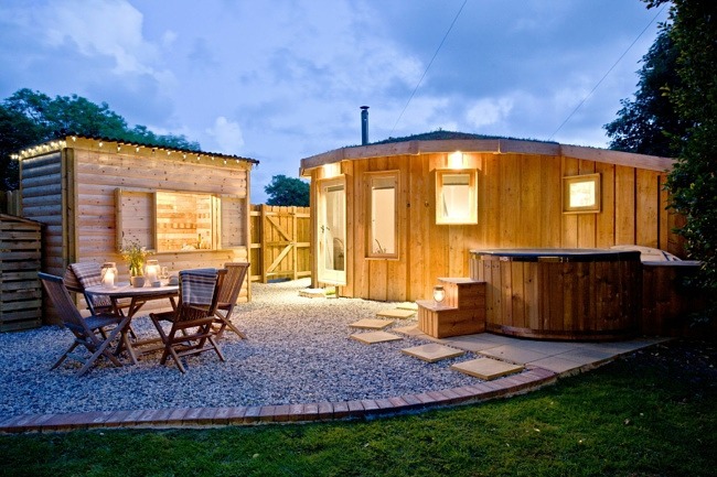 The Secret Roundhouse lit up at night - The Secret Roundhouse
