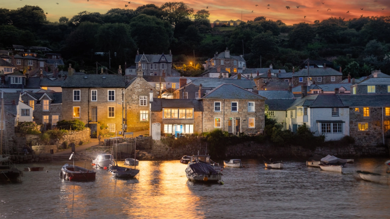 Mousehole harbour looking magical for a festive holiday in Cornwall