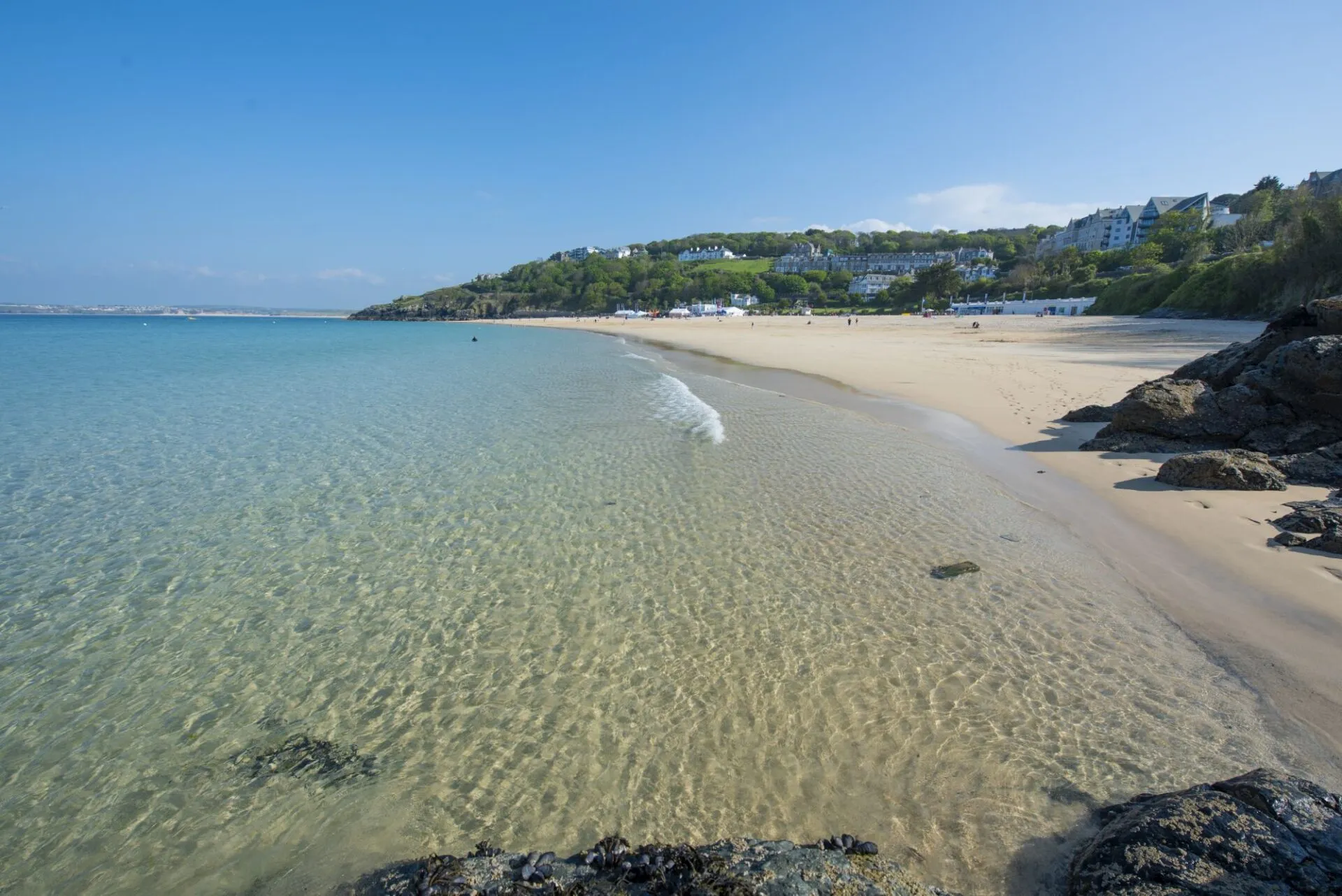 Clear water and golden sand at Porthminster Beach in St Ives, Cornwall
