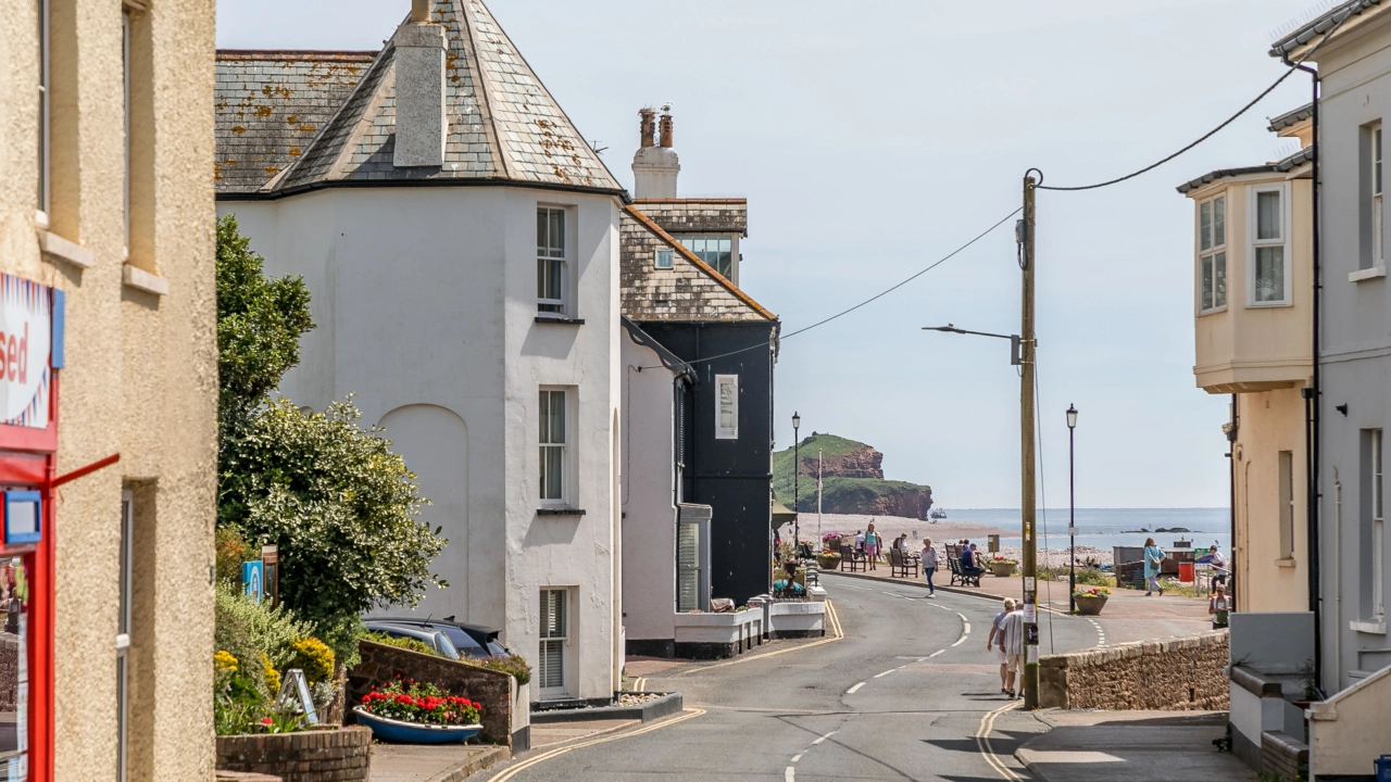 View down to the beach from the high street in Budleigh Salterton, East Devon holiday cottages