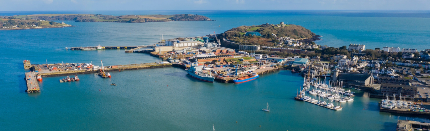 Aerial view of Falmouth harbour and across the sea to the Roseland Peninsula in Cornwall