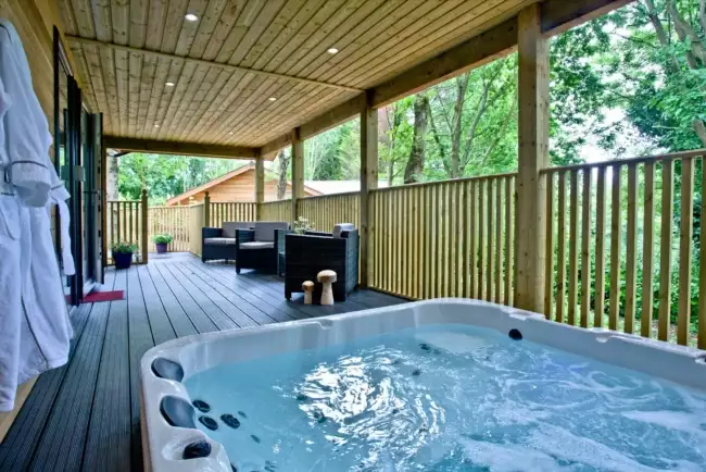 Hot tub on the decking - Cedar Lodge