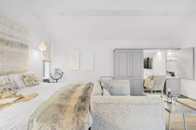 Open plan interior with seati ng for 2 and King size bed - Cottage Suite 2, Kentisbury Grange